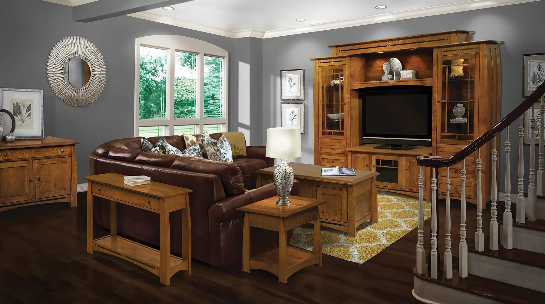 Boulder Creek collection solid wood TV stand, coffee table and end tables in a living room with a leather sofa