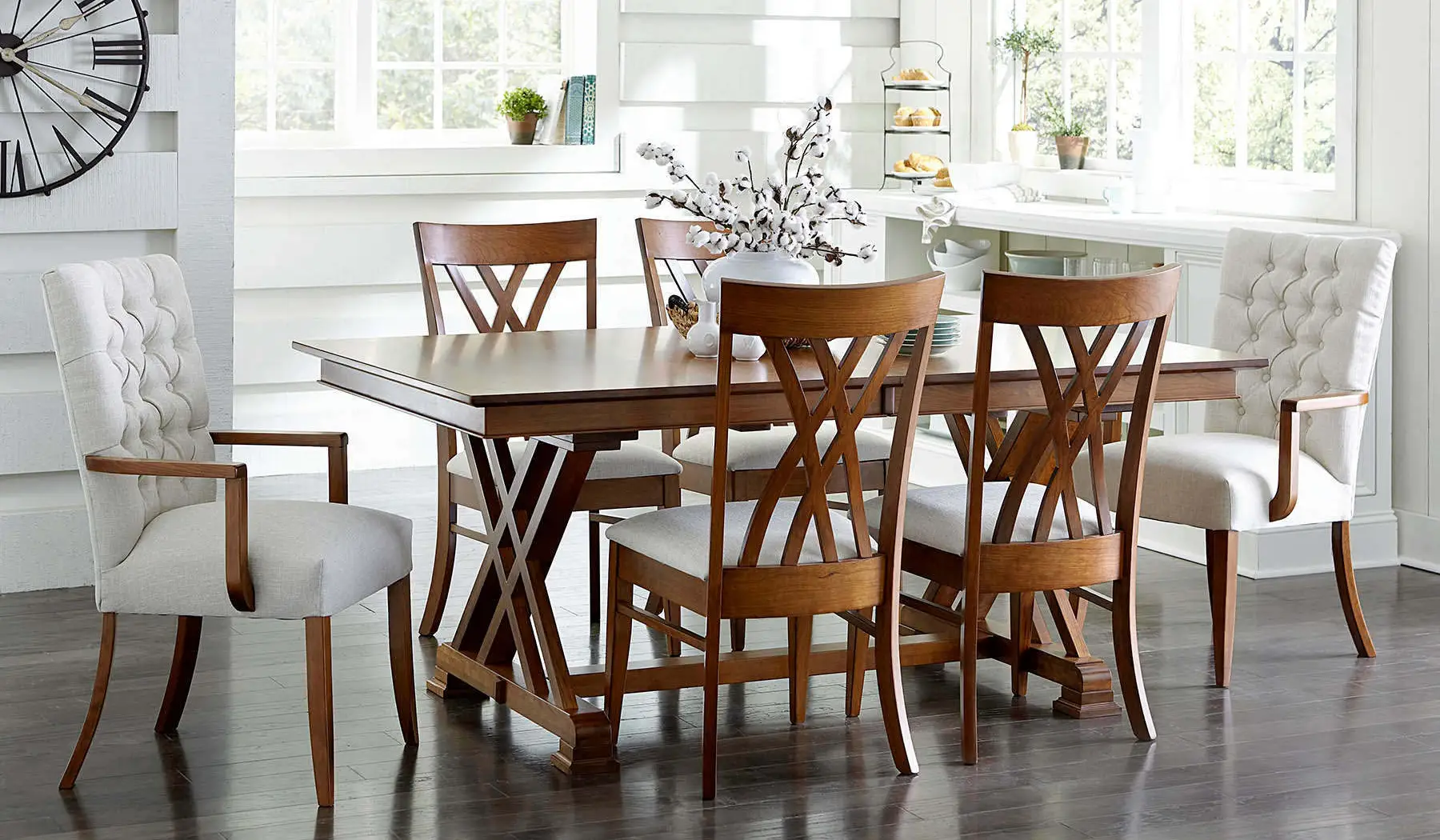 Hyerly solid wood dining table with upholstered and wood chairs